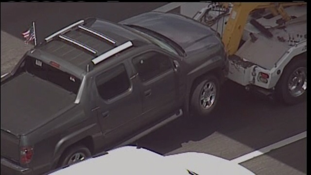 Zimmerman's truck damaged