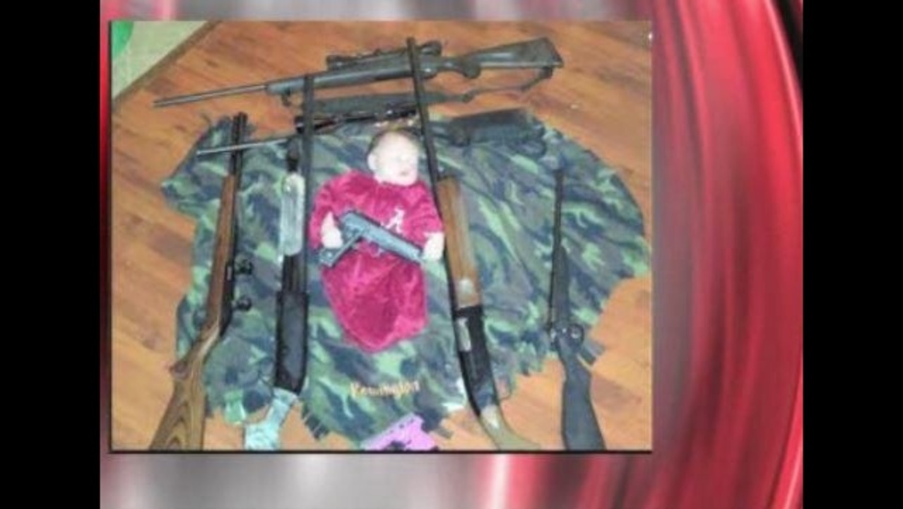 Picture posted on social media shows baby holding gun